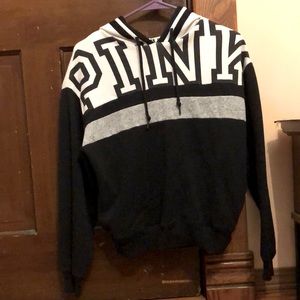 Black white and grey sweatshirt pockets on the side